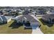 One-story house with a large backyard, viewed from above at 1695 Doves View Cir, Auburndale, FL 33823