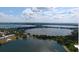 Aerial view of a community near a large lake at 1700 6Th Nw St # C27, Winter Haven, FL 33881