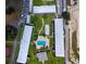 Aerial view of community with pool and buildings at 1700 6Th Nw St # C27, Winter Haven, FL 33881
