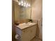 Well-lit bathroom featuring a vanity with a sink and mirror at 1700 6Th Nw St # C27, Winter Haven, FL 33881
