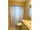 Bathroom with shower/tub combo, toilet, and vanity with sink at 1700 6Th Nw St # C27, Winter Haven, FL 33881