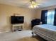 Bedroom with a double bed, TV, and a workspace at 1700 6Th Nw St # C27, Winter Haven, FL 33881