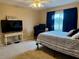 Bedroom with a double bed, TV, and a workspace at 1700 6Th Nw St # C27, Winter Haven, FL 33881