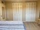 Bedroom with double bed, large closets, and window at 1700 6Th Nw St # C27, Winter Haven, FL 33881