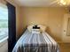Bedroom with double bed, large closets, and window at 1700 6Th Nw St # C27, Winter Haven, FL 33881