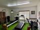 Exercise room with Pilates equipment and a treadmill at 1700 6Th Nw St # C27, Winter Haven, FL 33881