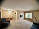Living room with view of the pool and dining area at 1700 6Th Nw St # C27, Winter Haven, FL 33881