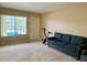 Bright living room with comfy sofa and view of the pool at 1700 6Th Nw St # C27, Winter Haven, FL 33881