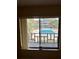 Window view overlooking the community pool and grounds at 1700 6Th Nw St # C27, Winter Haven, FL 33881