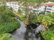 Apartment building near a pond with fountain at 200 El Camino Dr # 309, Winter Haven, FL 33884
