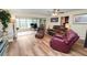 Living area showcasing leather furniture and a view of the lanai at 200 El Camino Dr # 309, Winter Haven, FL 33884