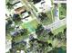 Detailed view of a real estate lot with visible boundaries, street access, and nearby properties in a residential area at 23 Lake Hollingworth, Lakeland, FL 33803