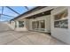 Covered patio with pavers and sliding glass doors at 2424 Delphi Cir, Lakeland, FL 33812