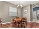 Formal dining room with hardwood floors and a traditional wooden table at 2507 Torrens Dr, Lakeland, FL 33805