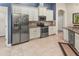 Modern kitchen featuring stainless steel appliances and white cabinets at 2507 Torrens Dr, Lakeland, FL 33805