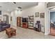 Living room with wood floors, a media center, and comfortable seating at 2507 Torrens Dr, Lakeland, FL 33805