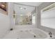 Relaxing bathroom with a large bathtub and shower at 2620 Jonila Ave, Lakeland, FL 33803