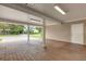 Covered brick-paved carport with access to the home at 2620 Jonila Ave, Lakeland, FL 33803