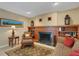 Cozy Gathering room with fireplace and built-in shelves at 2620 Jonila Ave, Lakeland, FL 33803
