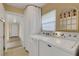 Bright laundry room with washer, dryer, and storage at 2620 Jonila Ave, Lakeland, FL 33803