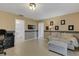 Home office with a comfortable couch and ottoman, near bathroom at 2620 Jonila Ave, Lakeland, FL 33803