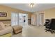 Home office with built-in shelving and access to a sunroom at 2620 Jonila Ave, Lakeland, FL 33803
