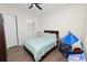 Bedroom with a teal comforter and a play tent at 3131 Sanctuary Cir, Lakeland, FL 33803