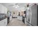 Well-equipped kitchen with stainless steel appliances and white cabinets at 3173 Sand Trap Ct, Lakeland, FL 33810