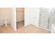 Bathroom with toilet, shower, and walk-in closet at 3648 Julius Estates Blvd, Winter Haven, FL 33881