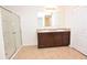 Double vanity bathroom with large mirror and shower at 3648 Julius Estates Blvd, Winter Haven, FL 33881