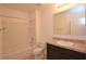 Bathroom with tub, toilet, vanity, and mirror at 3648 Julius Estates Blvd, Winter Haven, FL 33881