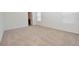 Bright bedroom with neutral carpeting and access to bathroom at 3648 Julius Estates Blvd, Winter Haven, FL 33881