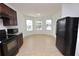 Eat-in kitchen with bay window and tile flooring at 3648 Julius Estates Blvd, Winter Haven, FL 33881