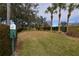 Community pet waste station with grassy area at 3648 Julius Estates Blvd, Winter Haven, FL 33881