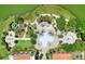 Aerial view of resort-style pool, landscaping, and pathways at 453 Treviso Dr, Kissimmee, FL 34759