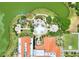 Bird's-eye view of pool, clubhouse, and landscaping at 453 Treviso Dr, Kissimmee, FL 34759