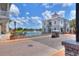 Attractive community entrance with a golf cart and fountain at 453 Treviso Dr, Kissimmee, FL 34759