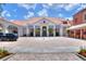 Grand community entrance with manicured landscaping at 453 Treviso Dr, Kissimmee, FL 34759