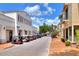 Quaint community street lined with shops and golf carts at 453 Treviso Dr, Kissimmee, FL 34759