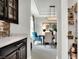 Elegant dining room with a view into the kitchen and pantry at 453 Treviso Dr, Kissimmee, FL 34759
