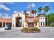 Stonegate Golf Club entrance with lush landscaping at 453 Treviso Dr, Kissimmee, FL 34759