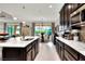 Spacious kitchen with island, stainless steel appliances, and ample cabinetry at 453 Treviso Dr, Kissimmee, FL 34759