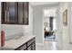 Butler's pantry with counter space and access to office at 453 Treviso Dr, Kissimmee, FL 34759