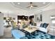 Open living room with views into the kitchen and dining area at 453 Treviso Dr, Kissimmee, FL 34759