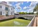 Stone bridge over canal with calm water at 453 Treviso Dr, Kissimmee, FL 34759