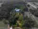 Property view showing house and surrounding land at 4850 Old Berkley Rd, Auburndale, FL 33823