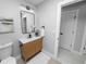 Modern bathroom with a sleek vanity and a large mirror at 5252 Post Ln, Lakeland, FL 33809