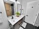 Modern bathroom with double vanity, and a large walk in shower at 5252 Post Ln, Lakeland, FL 33809