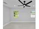 Bright bedroom with large windows and tile flooring at 5252 Post Ln, Lakeland, FL 33809
