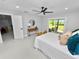 Comfortable bedroom with a queen-size bed and private access to patio at 5252 Post Ln, Lakeland, FL 33809
